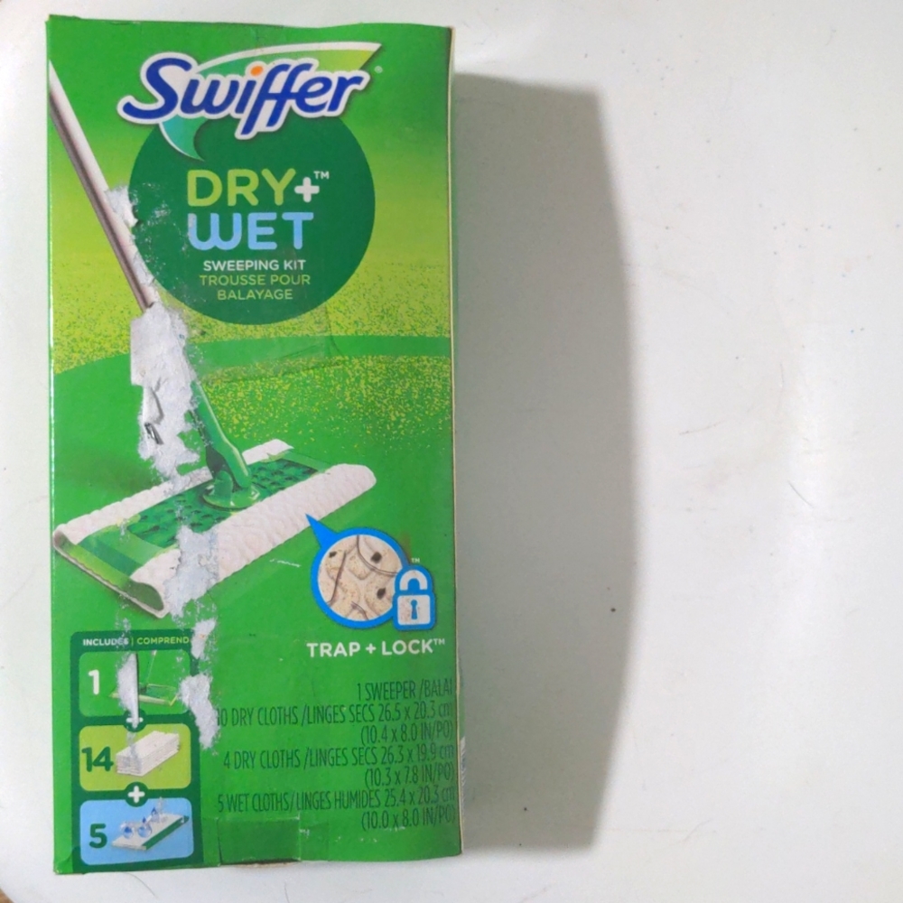 BNIB SWIFFER WET&DRY KIT- COMPLETE/UNOPENED. Outside of box scuffs are sole flaw
